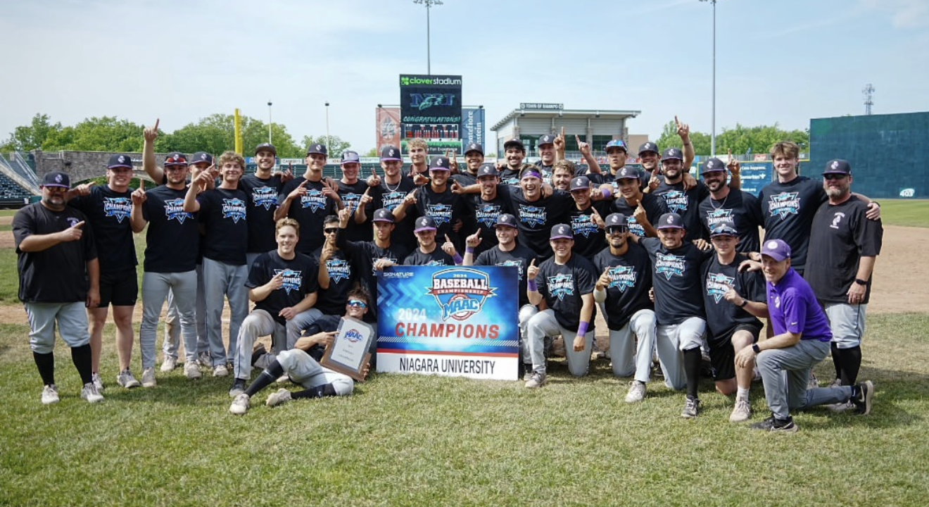 Niagara University baseball team celebrating their 2024 MAAC Championship on the field